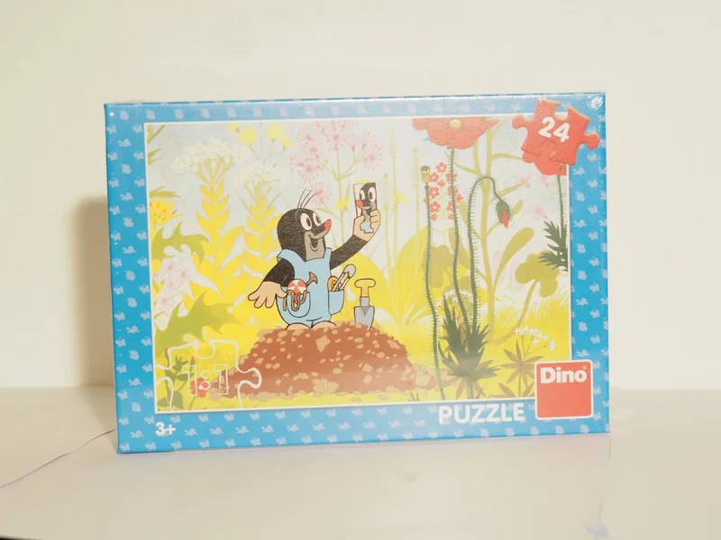 Kinder puzzel van Molletje van Dino, editie Meerkleurig – doos