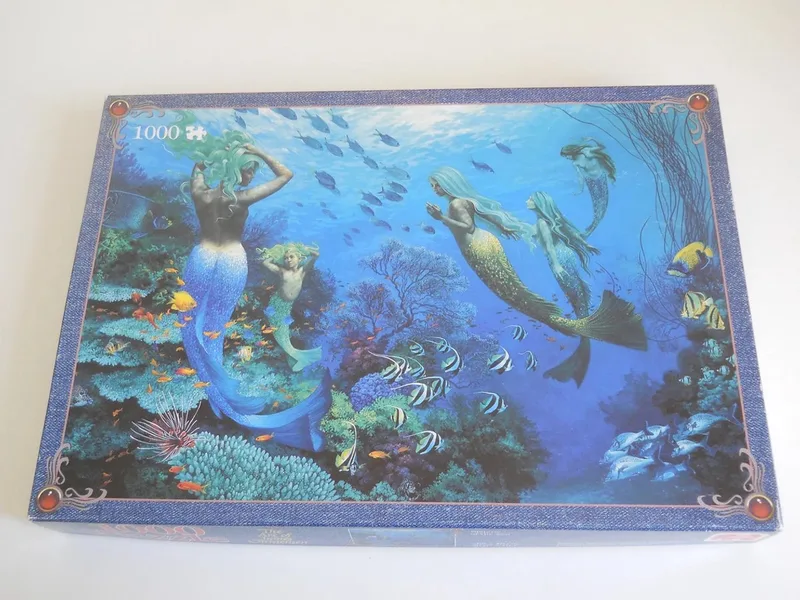 Puzzel Sisters of the sea by James Christensen van Jumbo, editie Blauw – doos